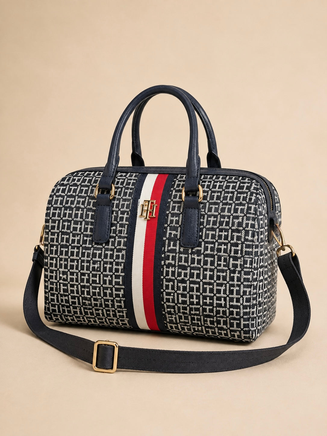Bolso TH manos libres tipo baúl azul estampado
